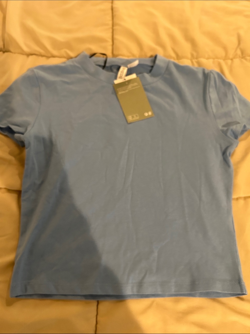 Divided tshirt - size M, NWT